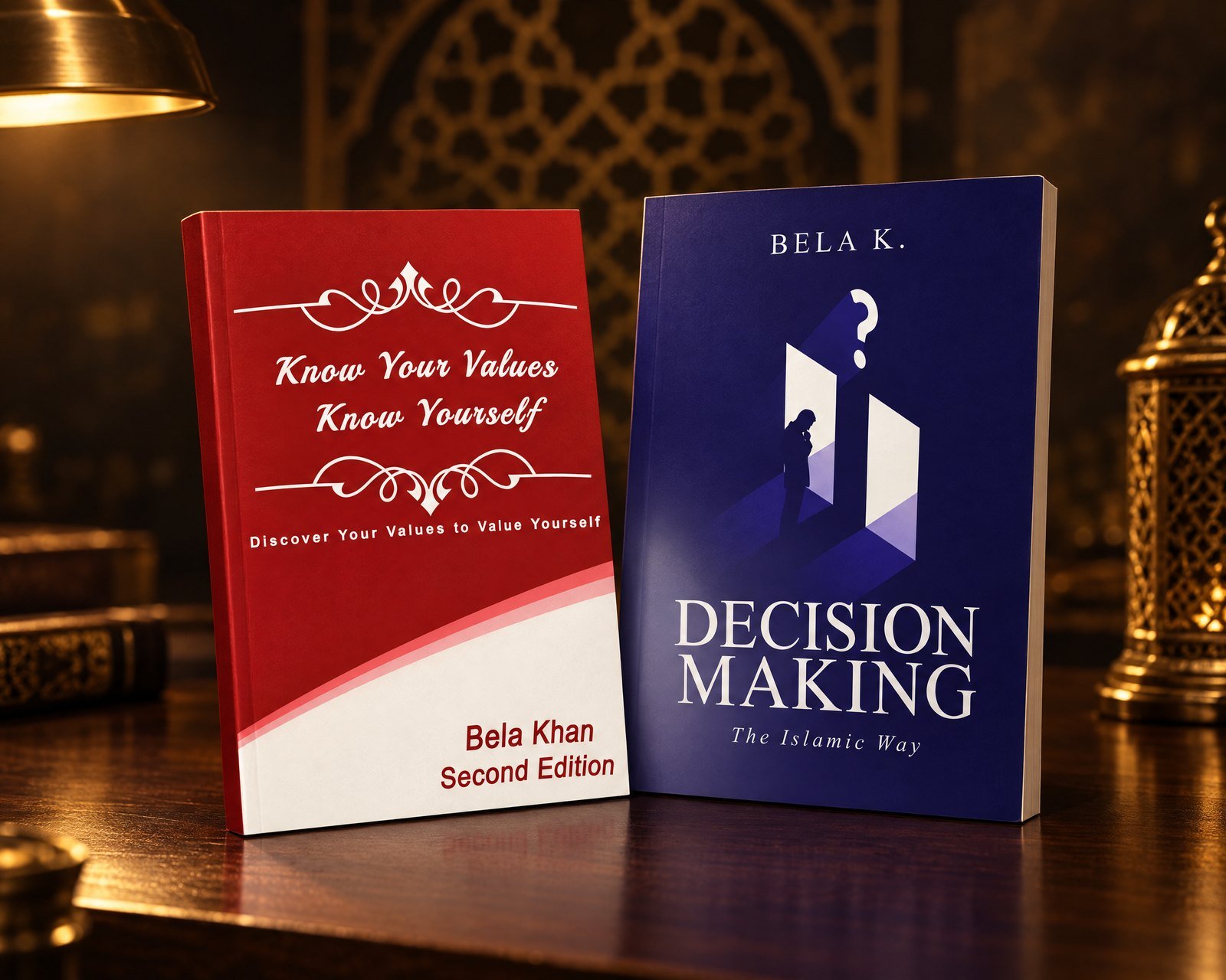 Bela Khan's two books standing side by side in warm lamplight